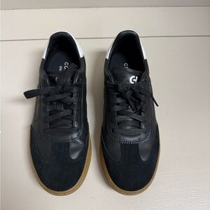 Cole Haan Breakaway Women’s Black & White Casual Sneakers with Gum Sole.